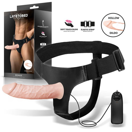 Diržai su tuščiavidure dildė ir vibracija